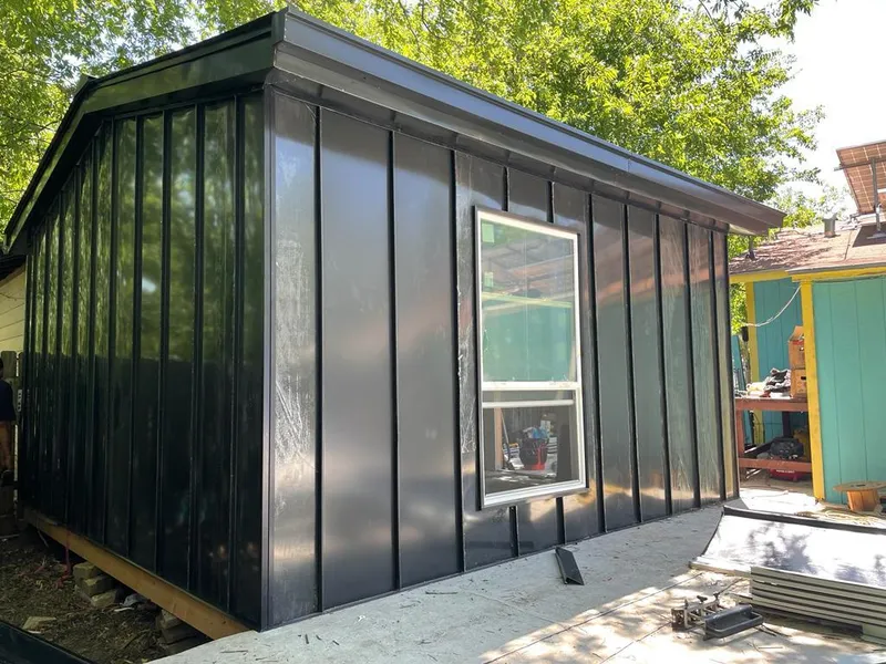 Black standing seam metal wall panels for Metal Roof Installation in Boaz