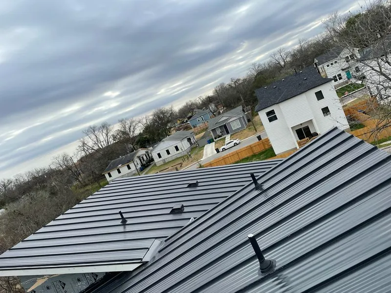 Standing seam metal roof panels with vents for Skylight Repair in Boaz